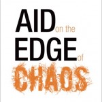 Aid on the Edge of Chaos